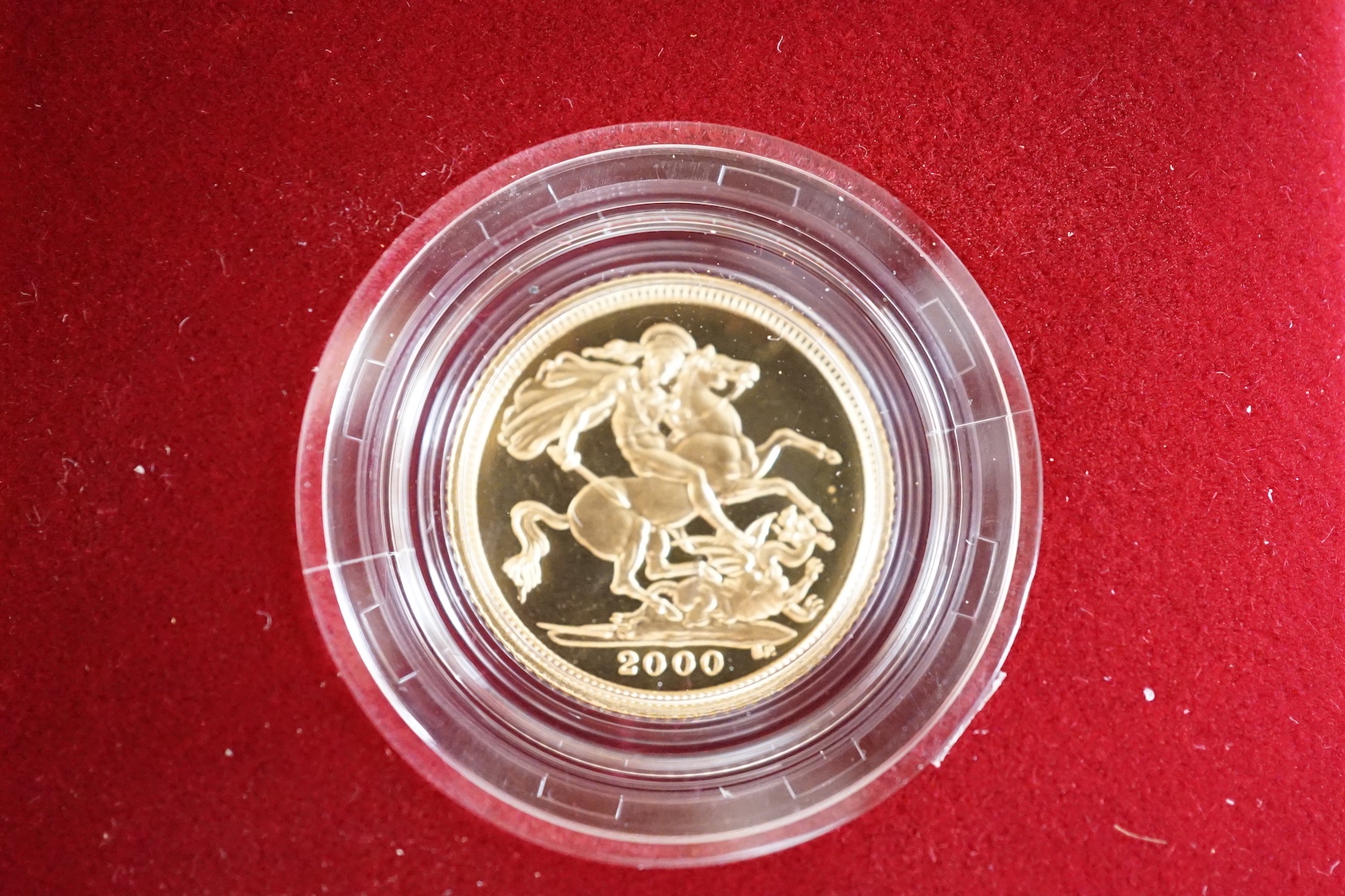 Two cased gold proof half sovereigns, 2000.